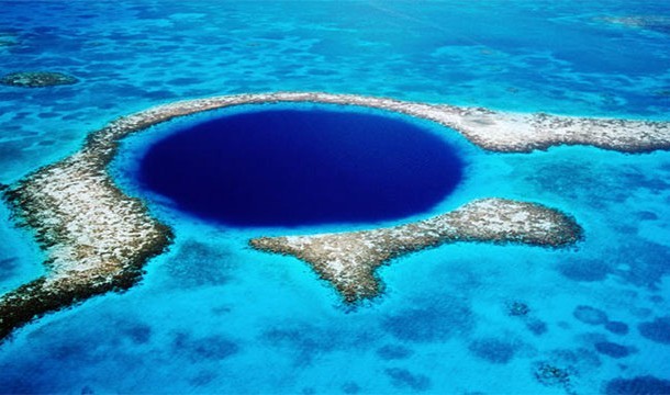 21. Great Blue Hole: This Belize attraction was formed through erosion way back when the sea level was much lower. 