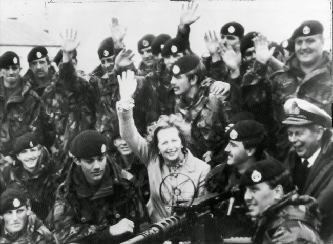 40.) Margret Thatcher with British troops after the surrender of Argentina in the Falklands War.