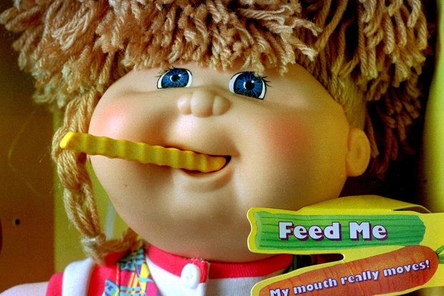 9.) Snack Time Cabbage Patch Kids had a pretty horrific flaw in their design. They would eat anything placed in their mouths, pulling it down into the doll which is good for the play food given with the toy, not so good for kids who put their fingers or hair in the mouth.