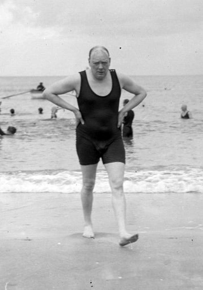 23.) Winston Churchill after a swim.