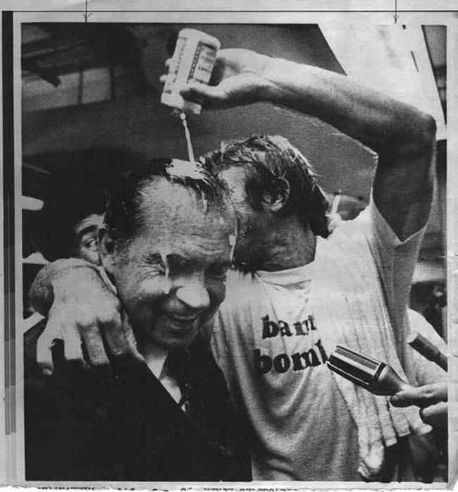 14.) Richard Nixon has a beer poured on his head by Bobby Grich after the LA Angeles win their division title.